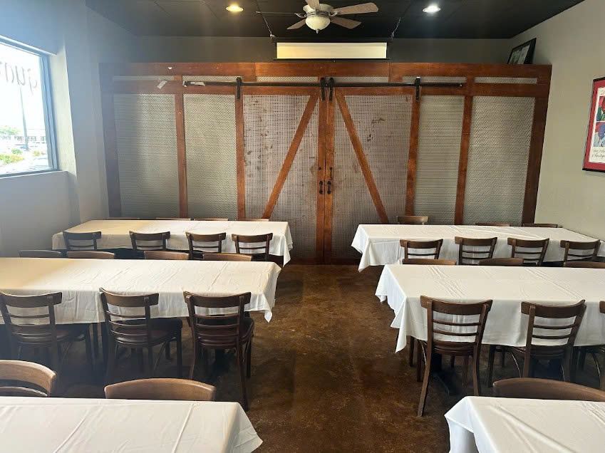 Banquet room with sliding barn doors